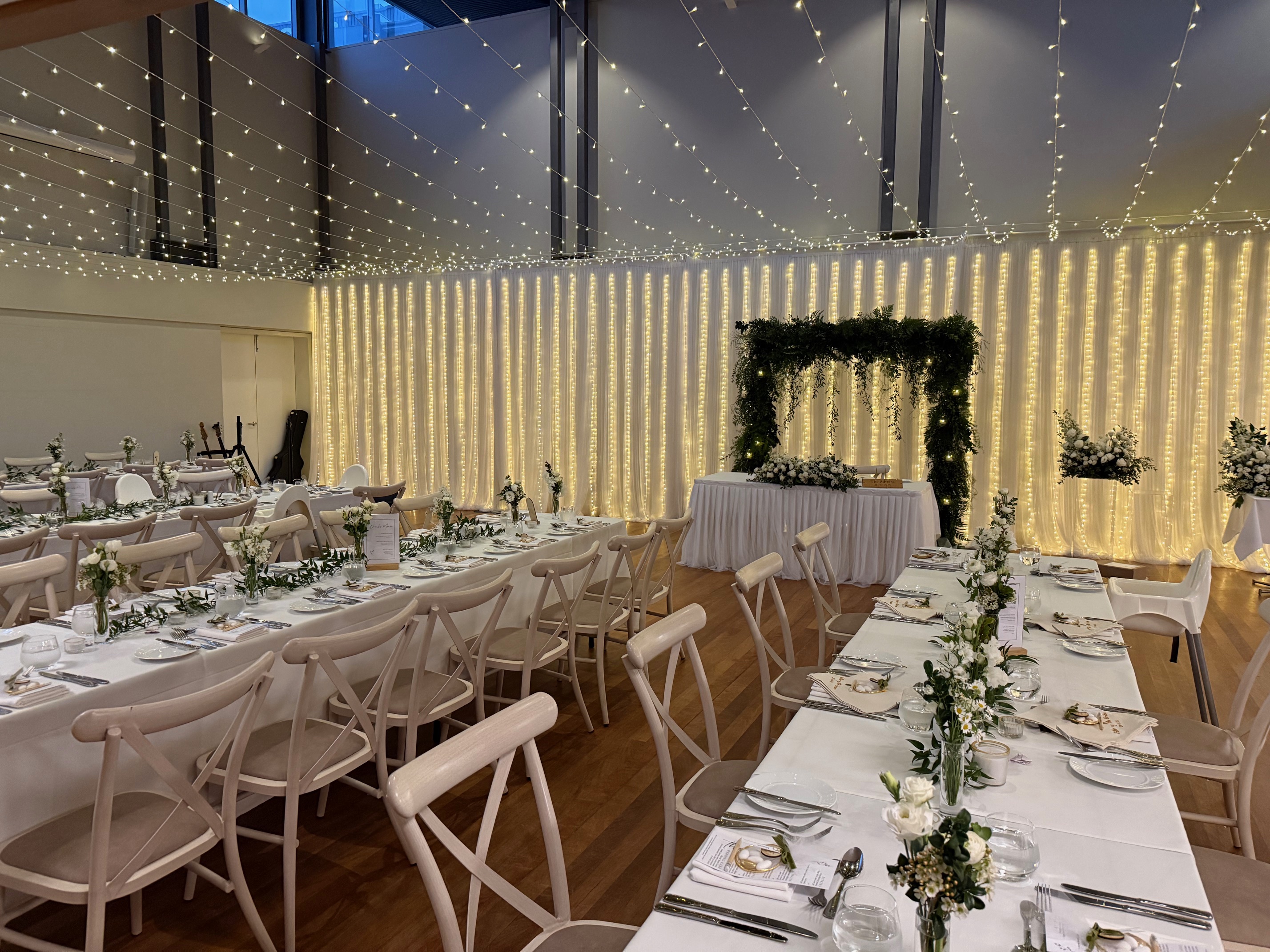 Ballroom with round tables and dance floor